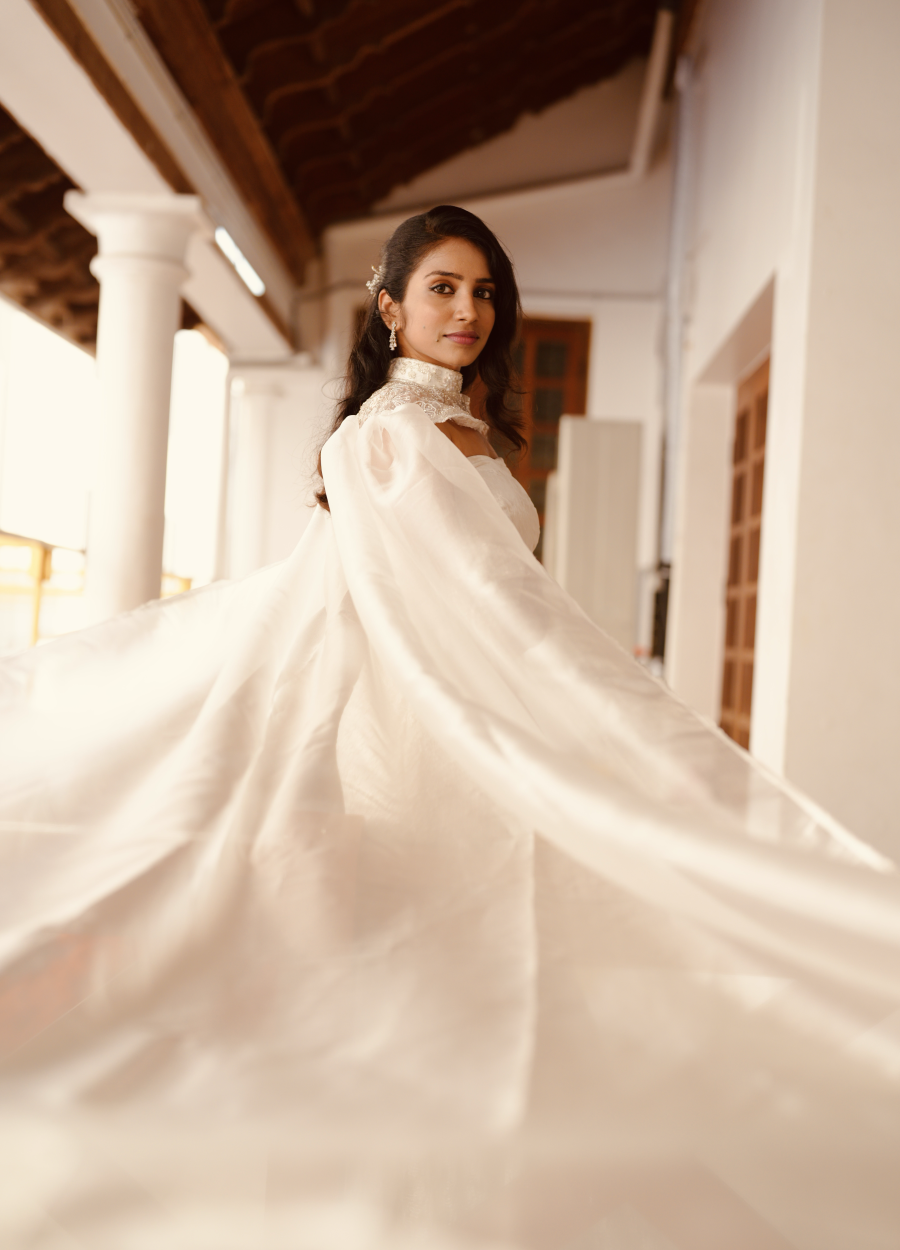 Catherine Nivedha in her bespoke wedding trousseau crafted by Design with Saa.  Photographed by Soundarya Tamilmaran