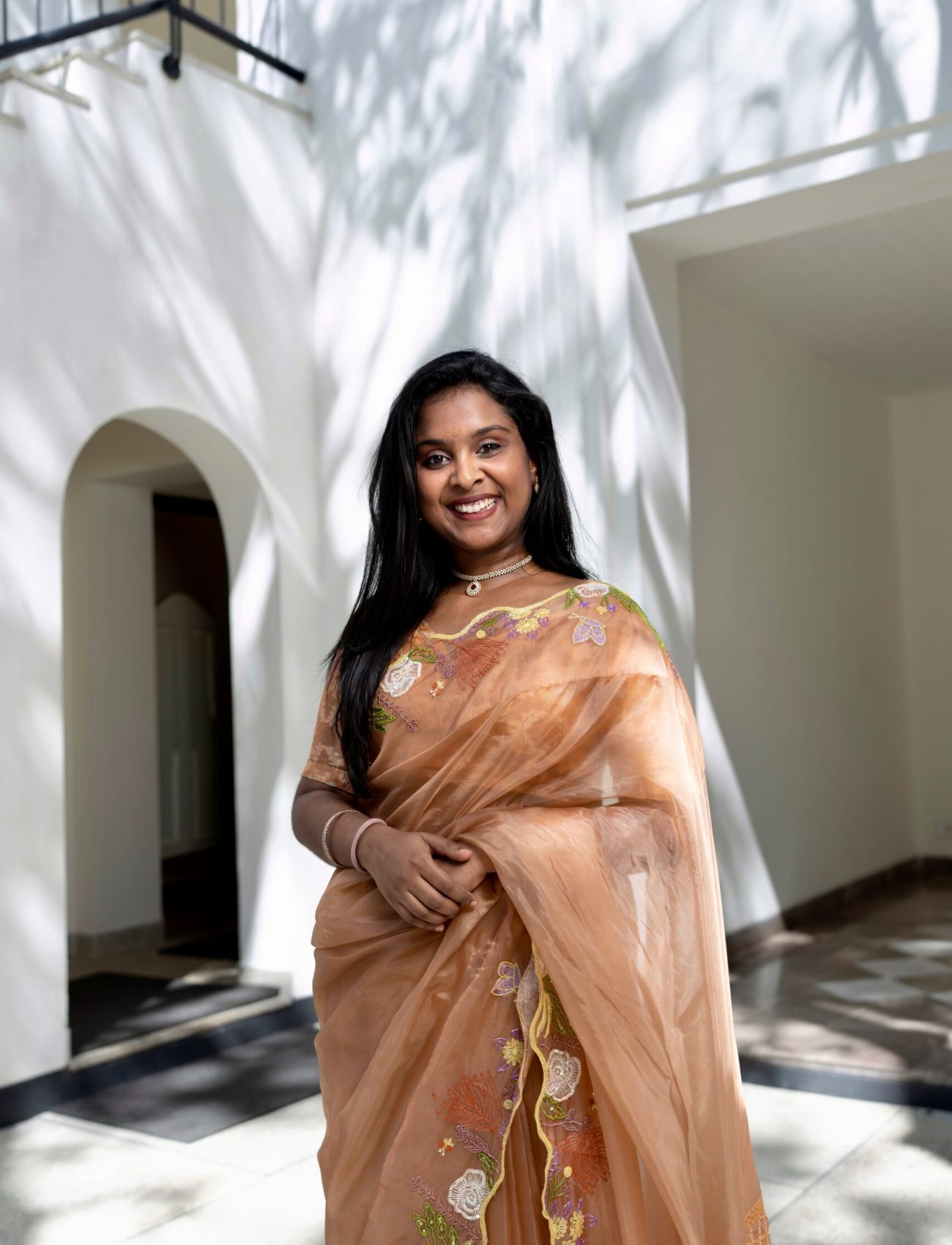 Ashaa Vigashini draped in a bespoke embroidered saree crafted by Design with Saa. Photographed by Shweta Balaji